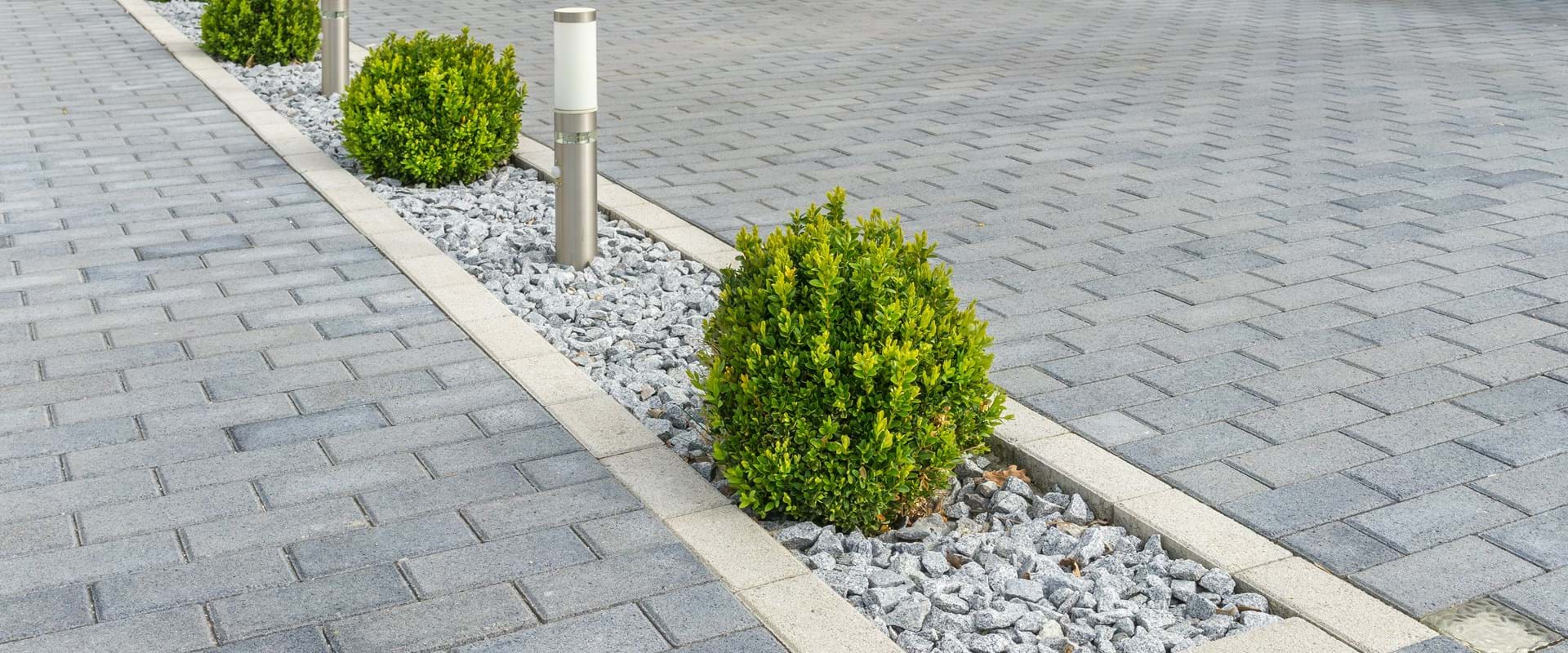 oprit laten bestraten kosten